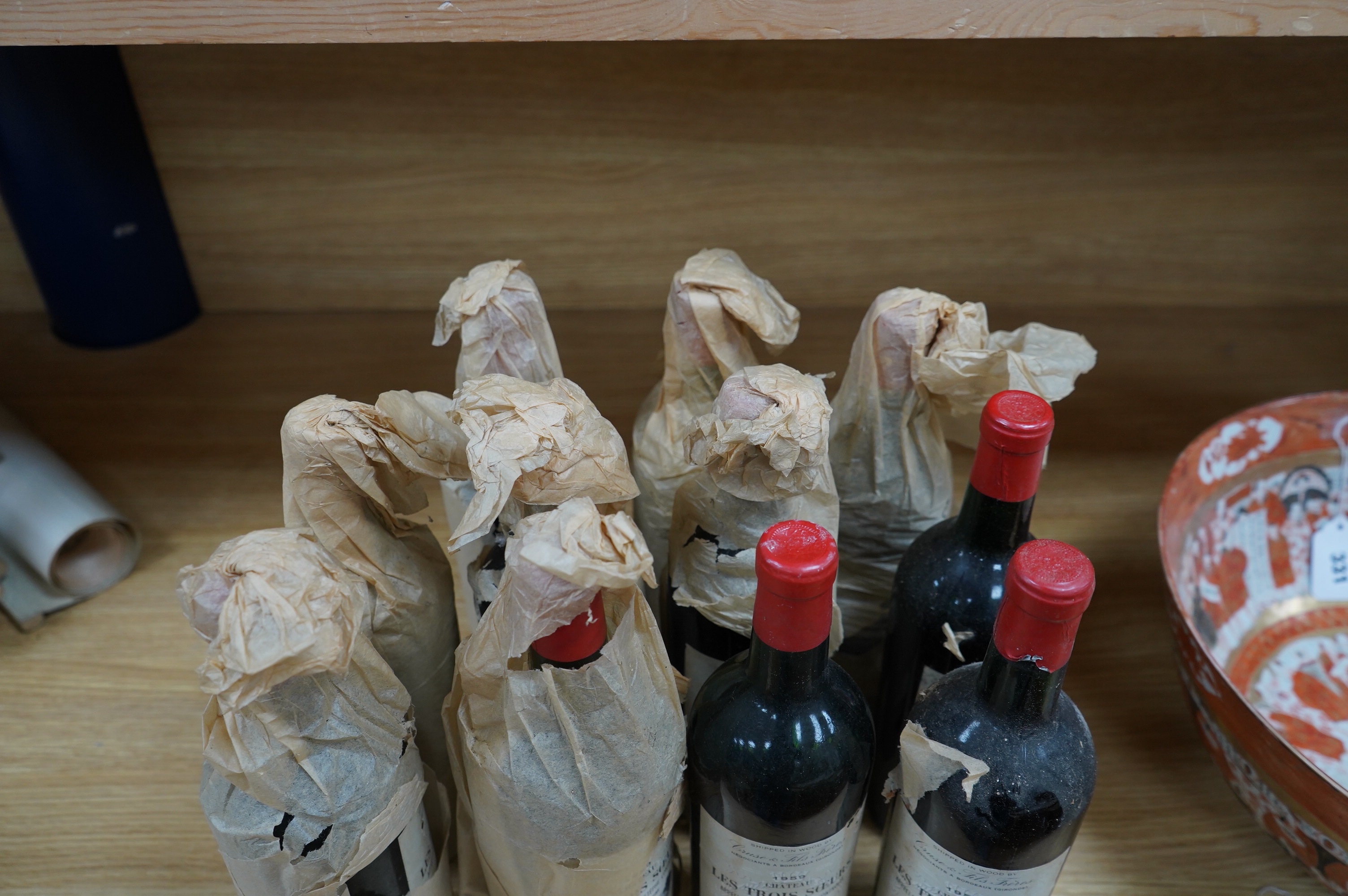 Eleven bottles of Chateau ‘Les Trois Soeurs’ Bordeaux , Cruse. Condition - fair, unknown storage